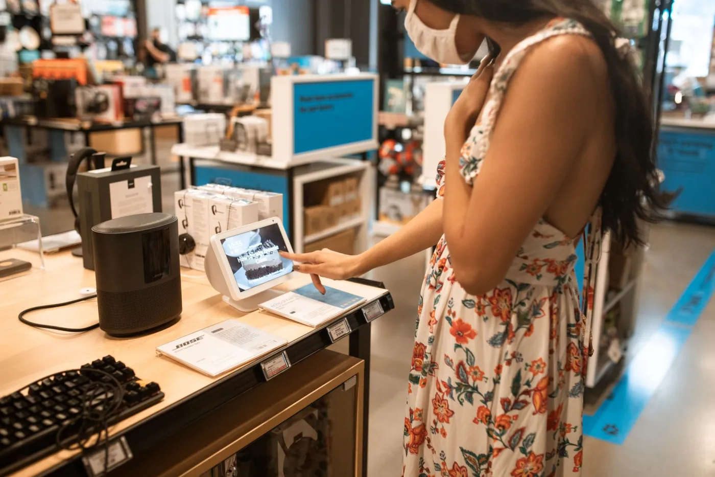 Digital promotional signage inside a retail environment.